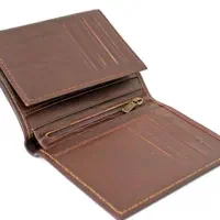 یک کیف قهوه ای حاوی پاسپورت گم شده