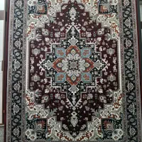 فروشنده در فرش فروشی