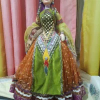 عروسک با لباس محلی