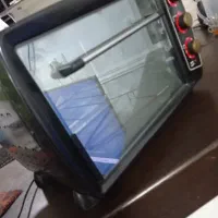 توستر کاملاً نو کم استفاده