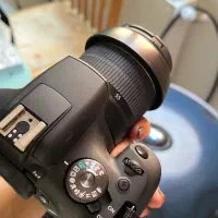 دوربین حرفه ای  کنون 2000d  با لنز 18-55