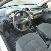 پژو ۲۰۶ وی۸ دریچه سیمی مدل ۹۴ سفید|خودرو سواری و وانت|بابل, |دیوار