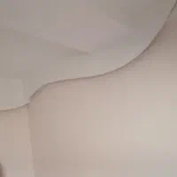 نقاشی ساختمان  با دستگاه ایرلس و سنباده برقی