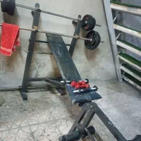 وسایل ورزشی7کاره بهمراه هالتردمبل،50کیلووزنه