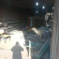 یک باب مغازه درو پنجره سازی