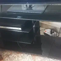 میز تلویزیون شیشه ای کشو دار