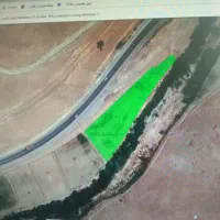 زمین کشاورزی لب جاده اصلی مریوان سنندج داری چاه اب