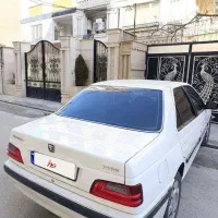 پژو پارس سفید کم کارکرد 70000مدل 1401 بدون رنگ