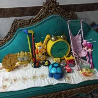 تاب بچه ساعت ومقداری اسباب بازی فروشی