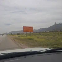 زمین برجاده اصلی نی‌ریز استهبان جنب سنگبری ها