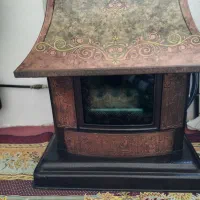 بخاری گازی طرح شومینه در حد نو