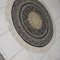 فرش گرد طوسی در حد آکبند