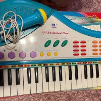 پیانو الکتریکی میکروفون‌دار