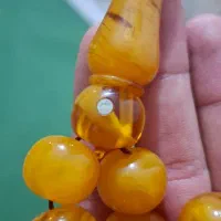 تسبیح کهربااستاد نظیر مزین با مهر نقره