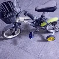 دوچرخه ۱۲ با کمک