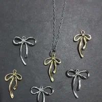 اکسسوری پلاک گردنبند و انگشتر و کلیپس تک و عمده