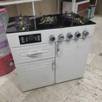 اجاق گاز فندک دار شیشه ۸ میل ولوم جلو جدید