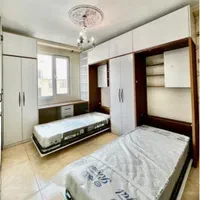 جابجایی،نصاب کابینت،درب چوبی،تخت تاشو،لوستر پرده