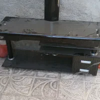میز تلوزیون شیشه دودی سالم در حد نو