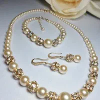 سفارش و ساخت طلا ومروارید واستیل رنگ ثابت