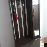 جا لباسی، کنسول ساعت ایستاده