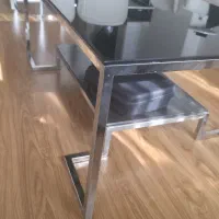 ست میز جلو مبلی و عسلی شیشه‌ای پایه استیل