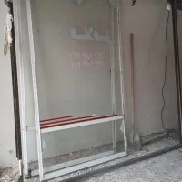 فروش درب مغازه سالم با در شیشه چهارچوب کرکره