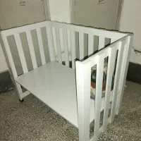 تخت نوزاد چرخ دار