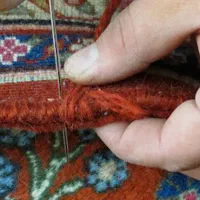 رفوگری فرش دوگره شیرازه چرم