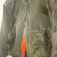 کاپشن خلبانی آلفا نو نو آمریکایی