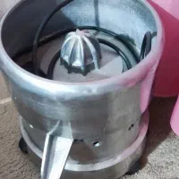 آب پرتقال گیر نیمه صنعتی