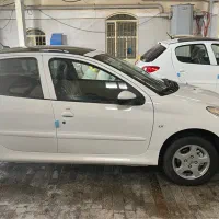 207 سقف شیشه tu5پلاس گارانتی فعال