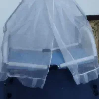 گهواره کنار تخت مادر