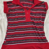 پالتوی زنانه رنگ کرم با تعدادی مانتو