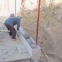 محوطه سازی باغچه و تعویض خاک و کاشت نهال و گل