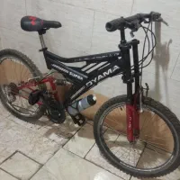 دوچرخه 24 دنده ای کمکدار حرفه ای در حد نو