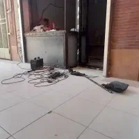 در کرکره.  در برقی.  جوشکاری.  درب آهنی