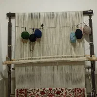 قالی به همراه دار