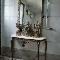 ایینه و شمعدان برنزی ،ساعت
