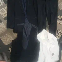 کت شلوار همراه با جلیقه لباس