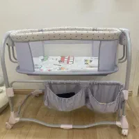 تخت کنار مادر نوزاد برقی موزیکال برند ماستلا