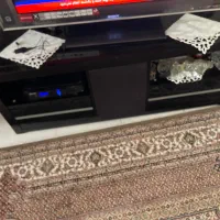 میز تلویزیون شیشه ای چوبی جنس خوب