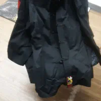 یک دست لباس کونفو در حد نو ۲ الی ۳ بار استفاده شده