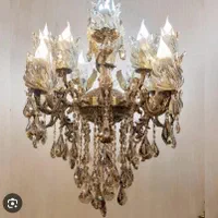 اینه شمدان و لوستر و کنسول بوفه ساعت و ویترنیها