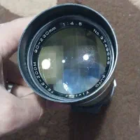 لنزتله زوم (اصل ژاپن) با دیافراگم باز وجای تک پایه