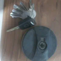 دسته کلید و درب باک پیدا شده