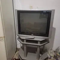 تلویزیون ال جی همراه با میز