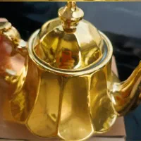قوری چینی  و سینی استیل