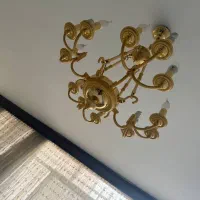 یک عدد لوستر چهارشاخه دوازده شعله