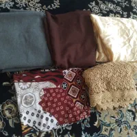 تعدادی پارچه و بلوز مجلسی